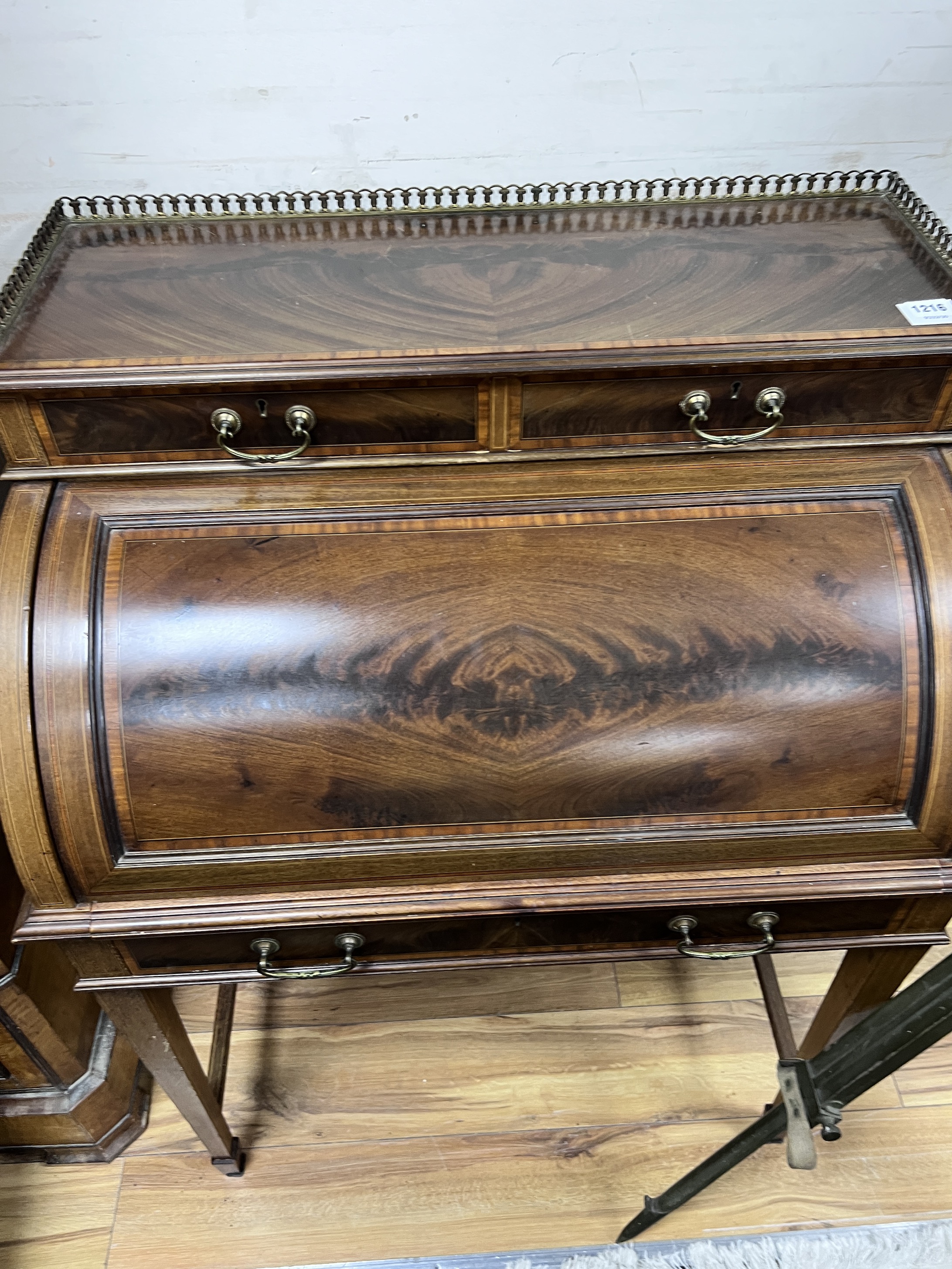 An Edwardian Maple & Co. satinwood banded cylinder bureau, width 79cm